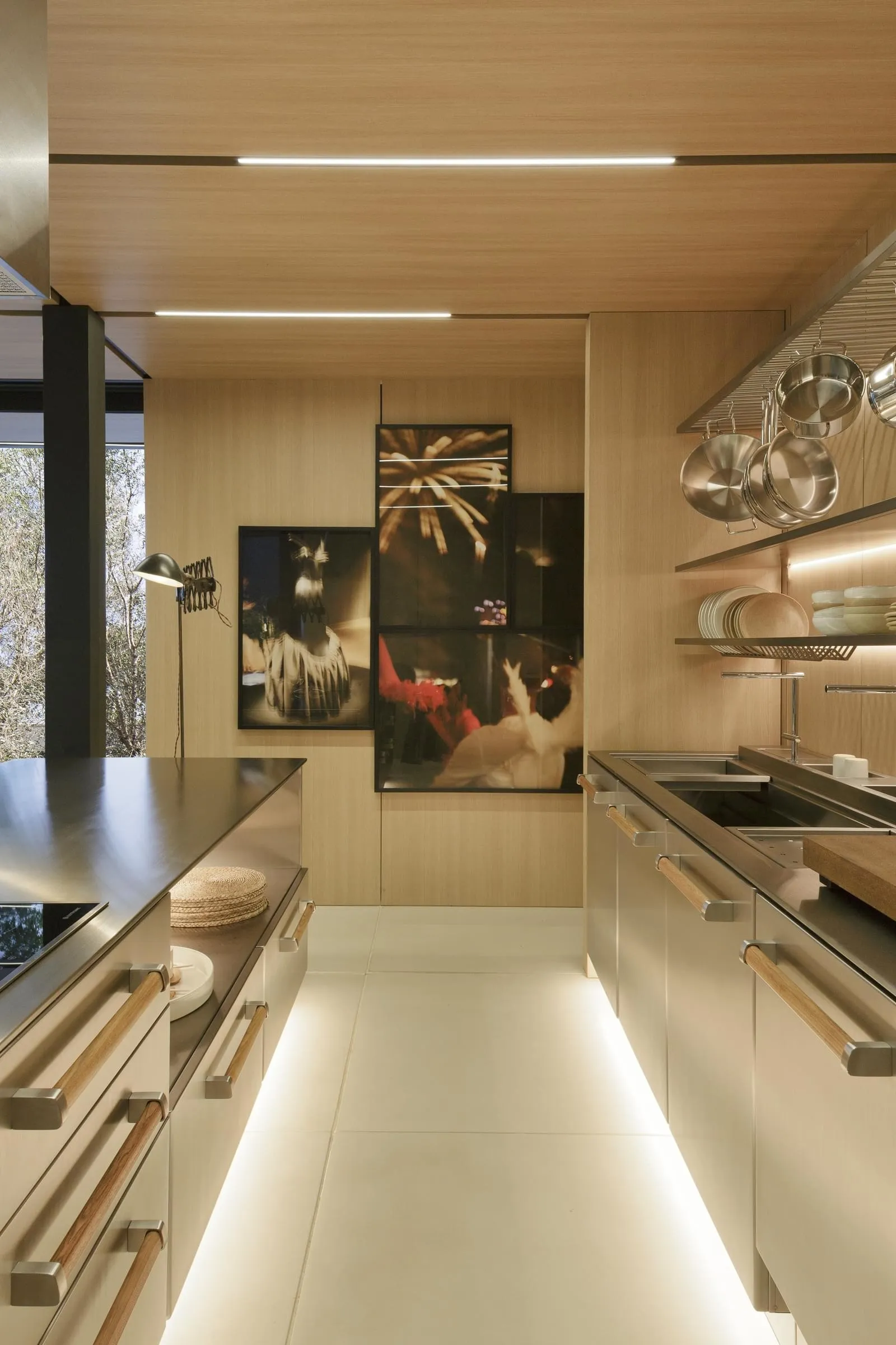 A modern residential kitchen featuring wooden cabinets.