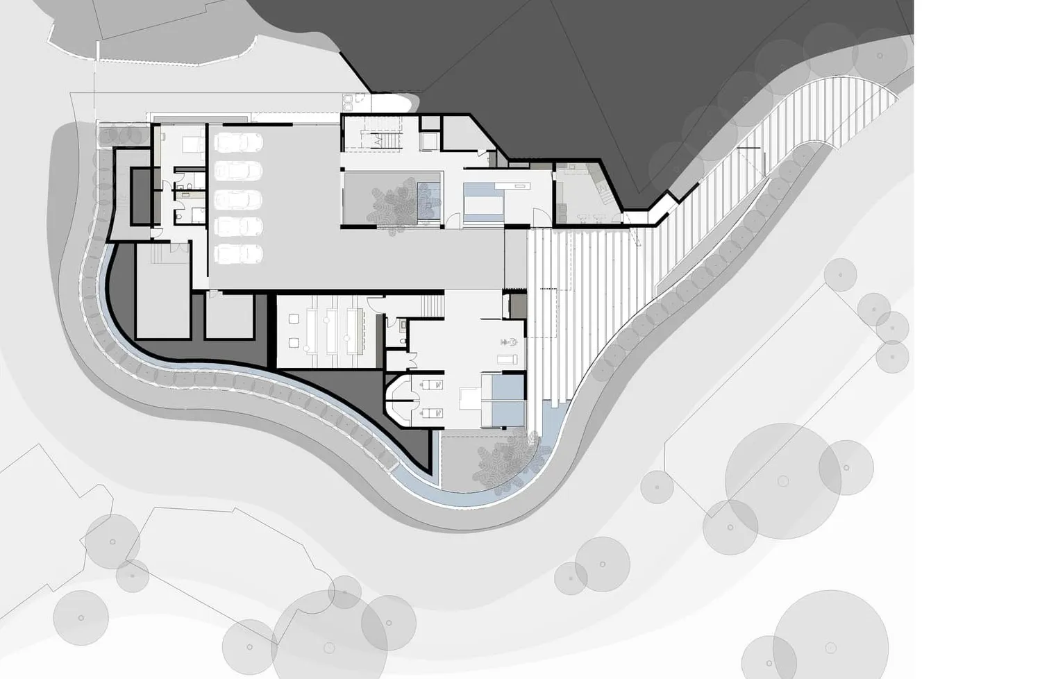 Modern residential floor plan depicting a contemporary house layout with various rooms and sections.
