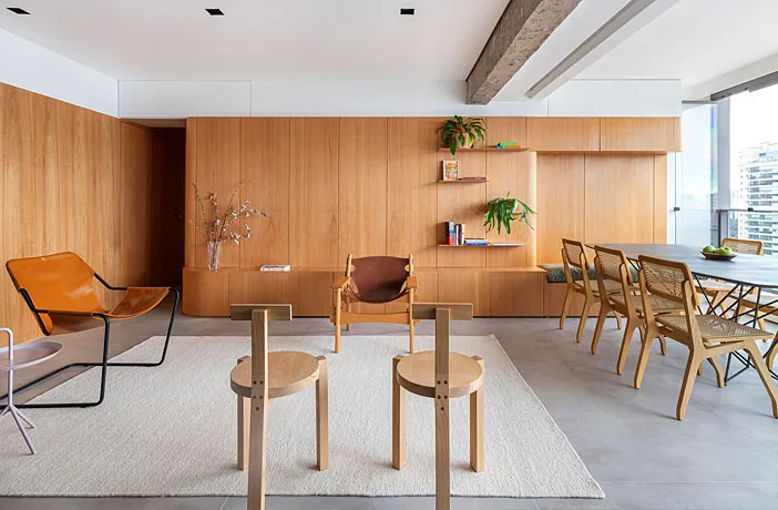 Modern interior with wooden furniture and a minimalist aesthetic.