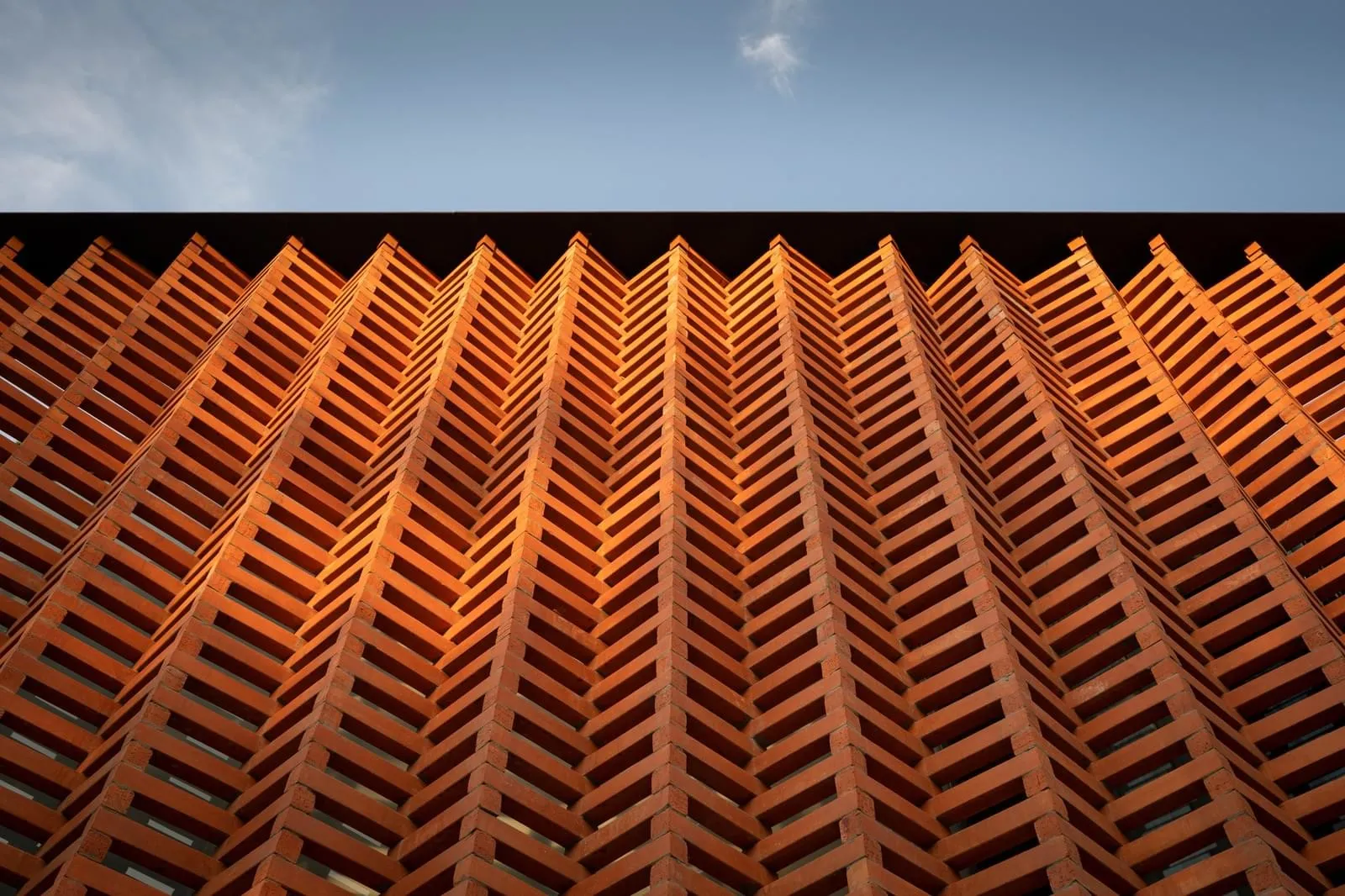 A close-up view of a modern urban design featuring a brick pattern.