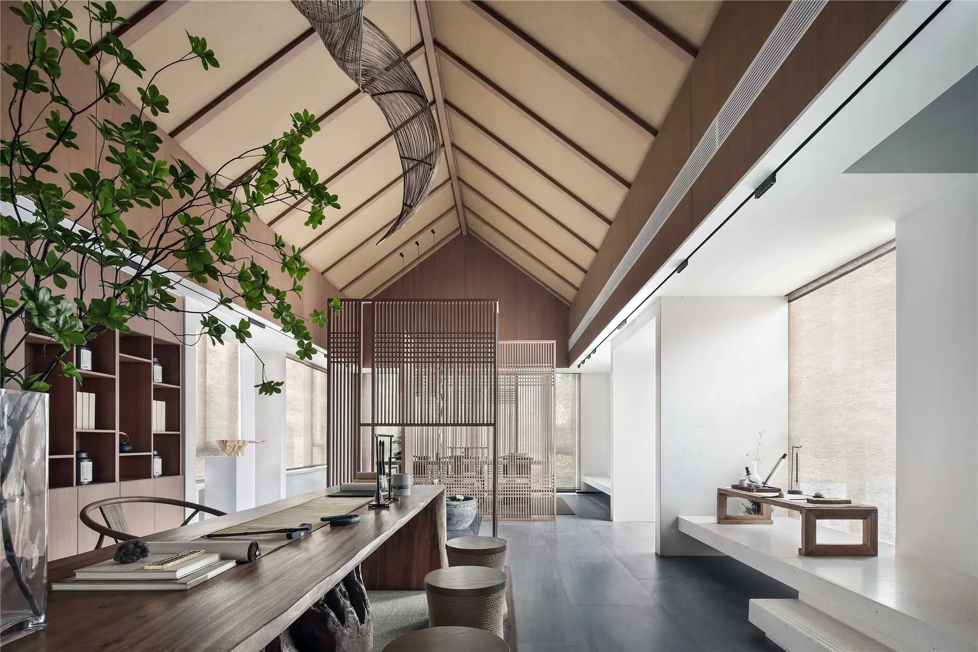Minimalist living room featuring a combination of wood and concrete materials.