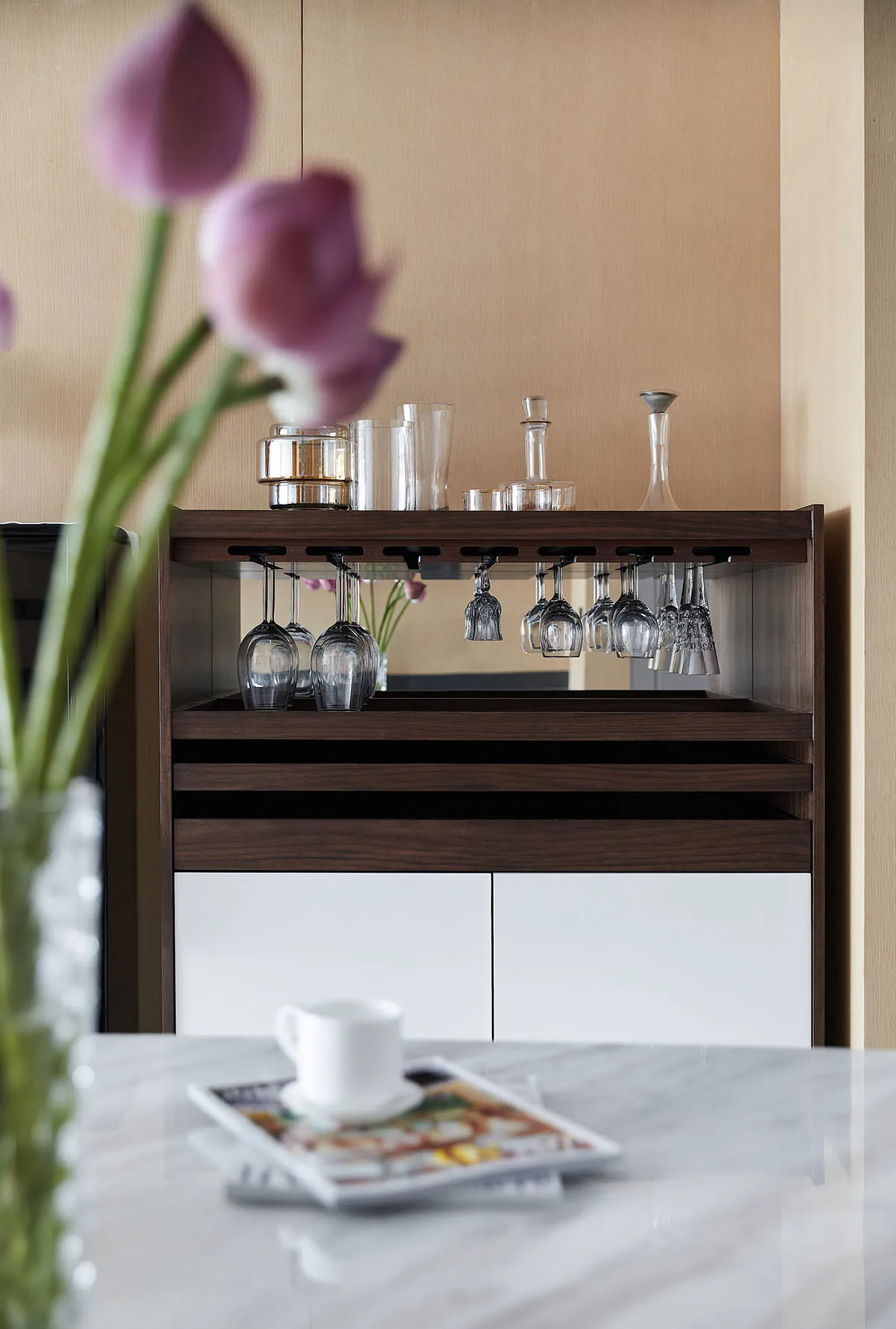 A modern kitchen storage system featuring a combination of wooden and composite materials.