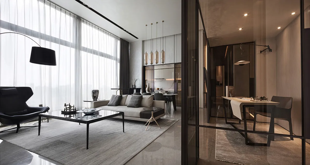 Modern living room with minimalist furniture, white sofas, and a contemporary design aesthetic.