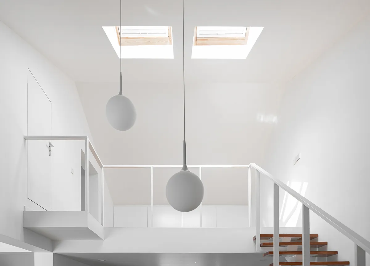 Modern minimalist staircase featuring white materials, viewed as a floor plan.