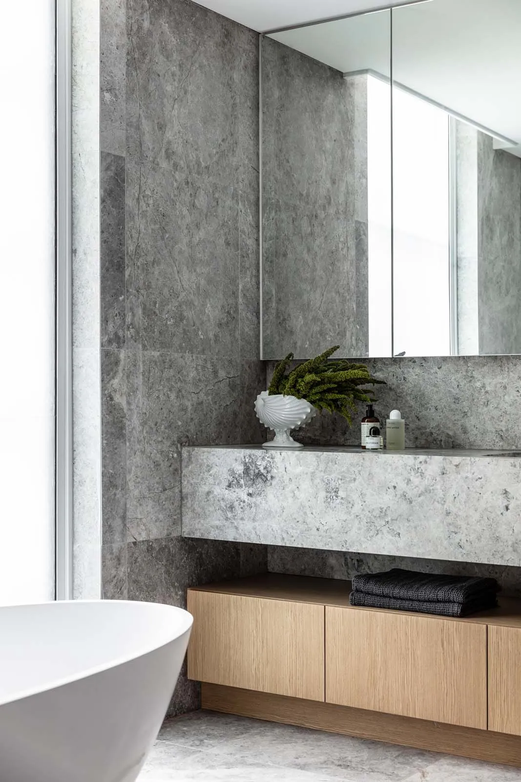 Modern bathroom with a sophisticated marble interior design.