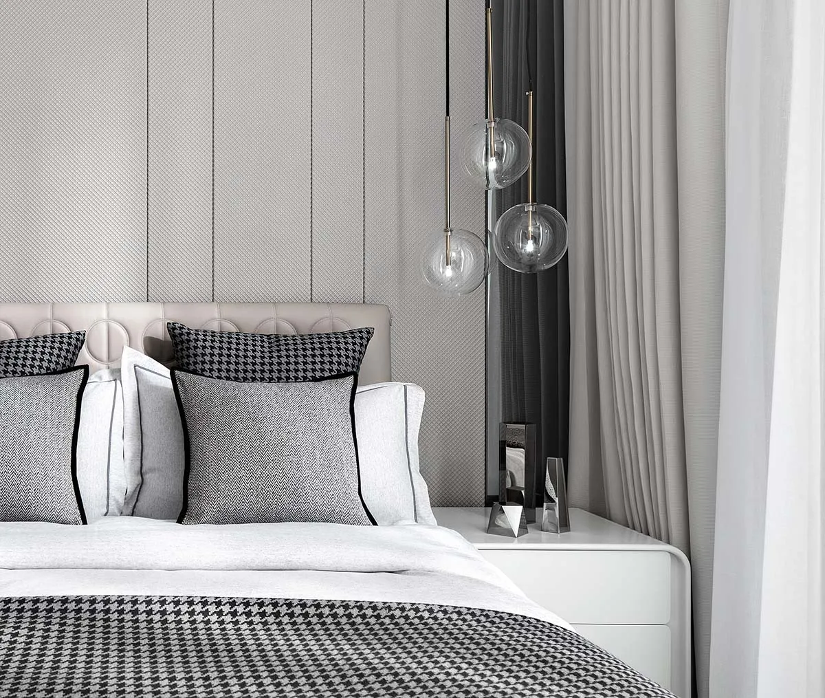 Modern minimalist bedroom featuring textured fabric curtains, a padded textile headboard, and pendant glass lighting fixtures
