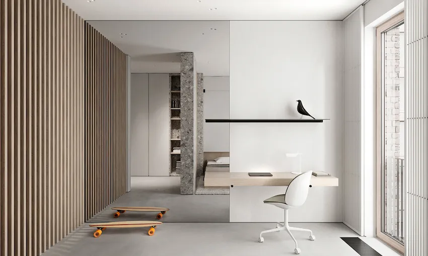 Minimalist workspace featuring a wooden desk and concrete columns.