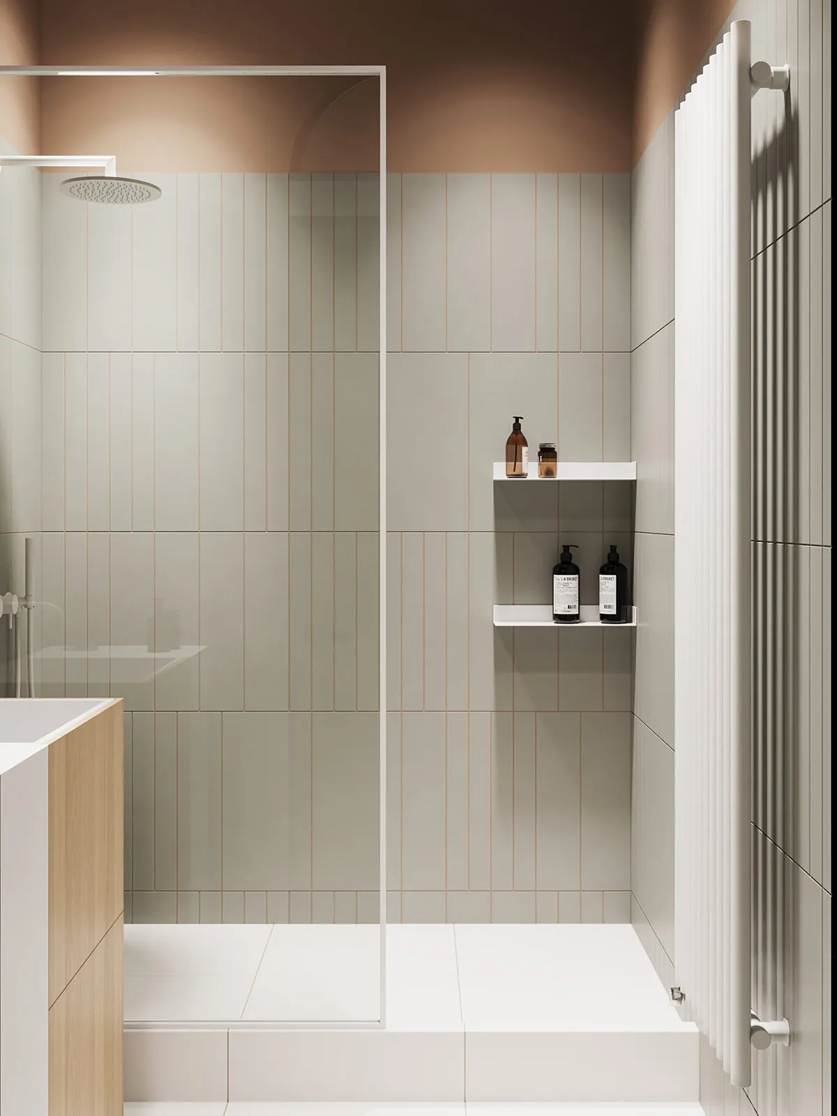 A modern minimalist bathroom with taupe ceramic tiles and a glass shower enclosure.