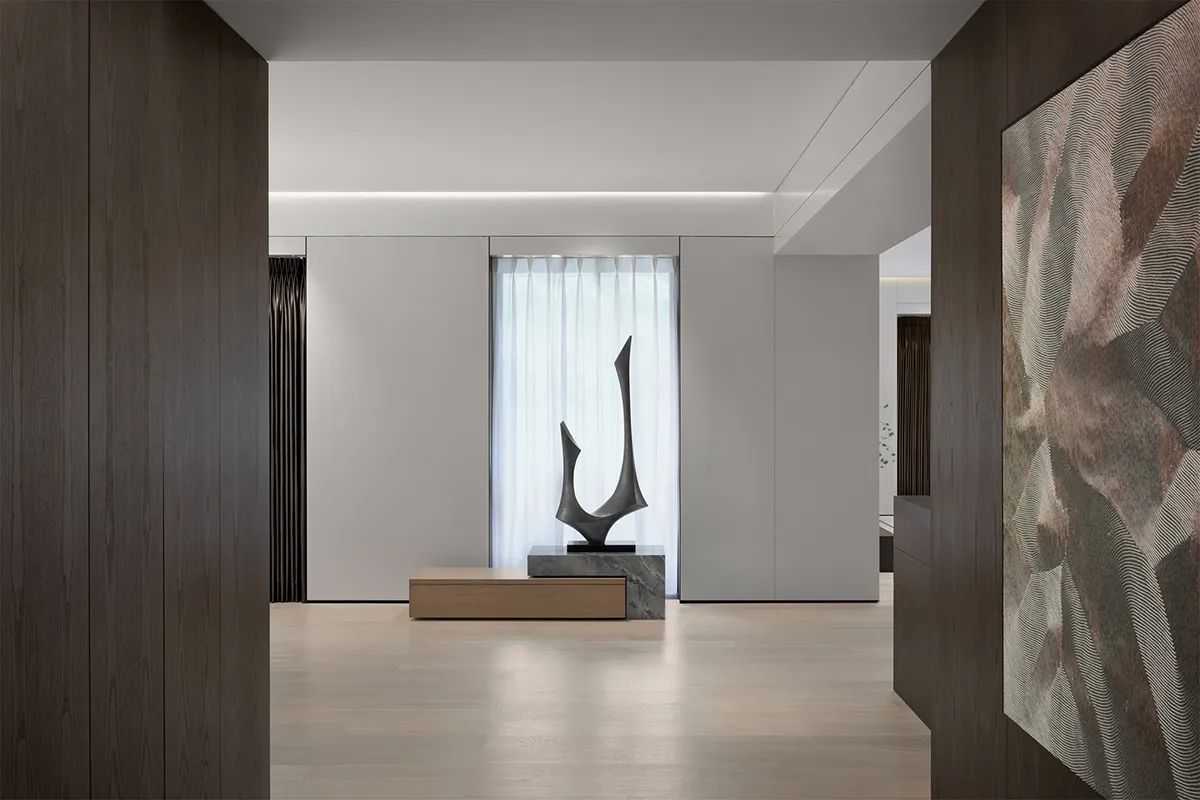 Modern minimalist living room featuring marble and wood