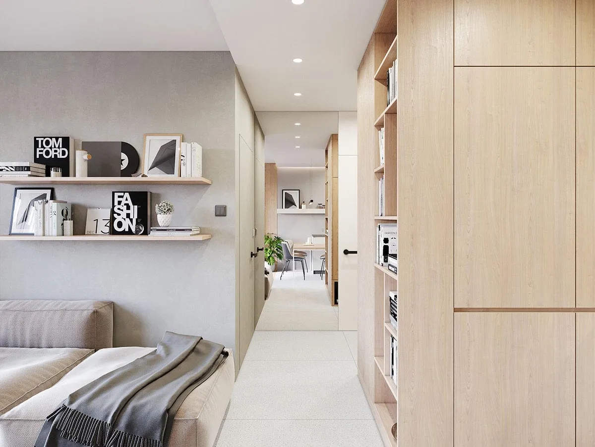 A minimalist residential interior featuring wooden materials and a neutral color palette.