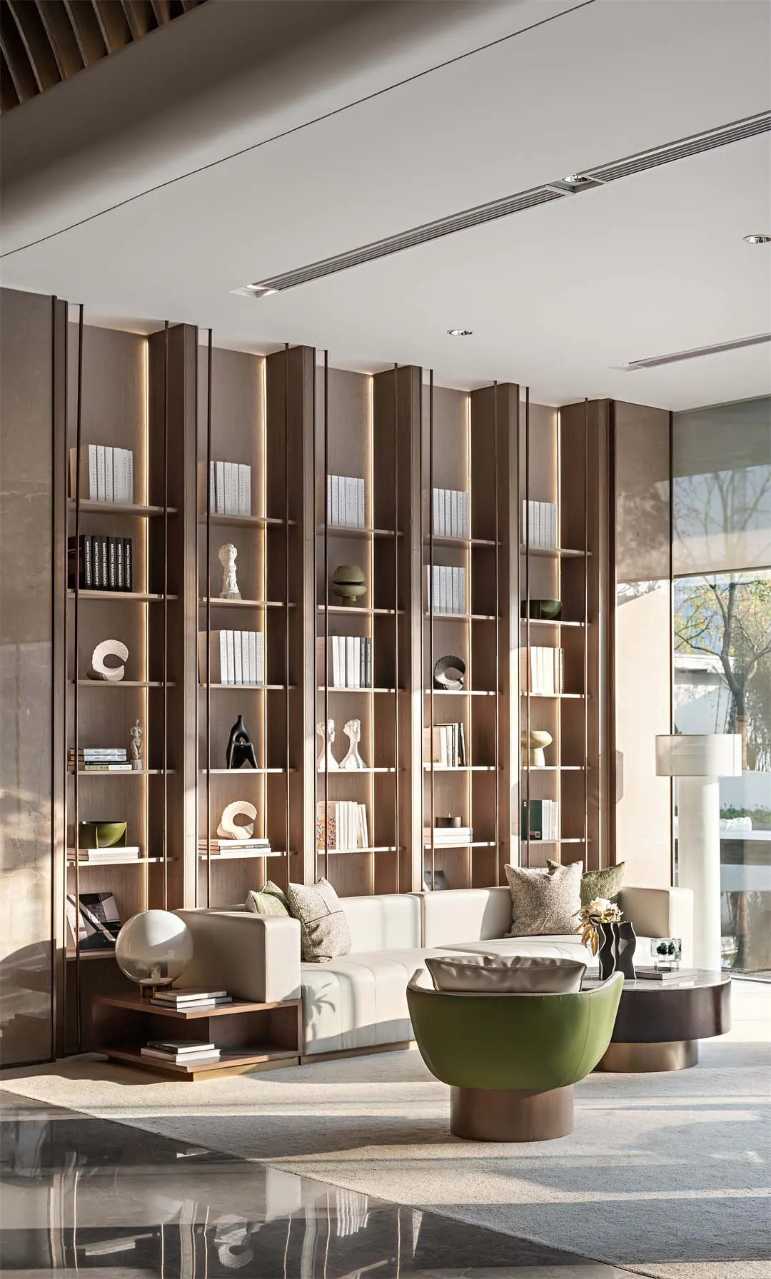 A modern minimalist living room featuring wooden shelves on the wall with books and decorative items, white sofas with green