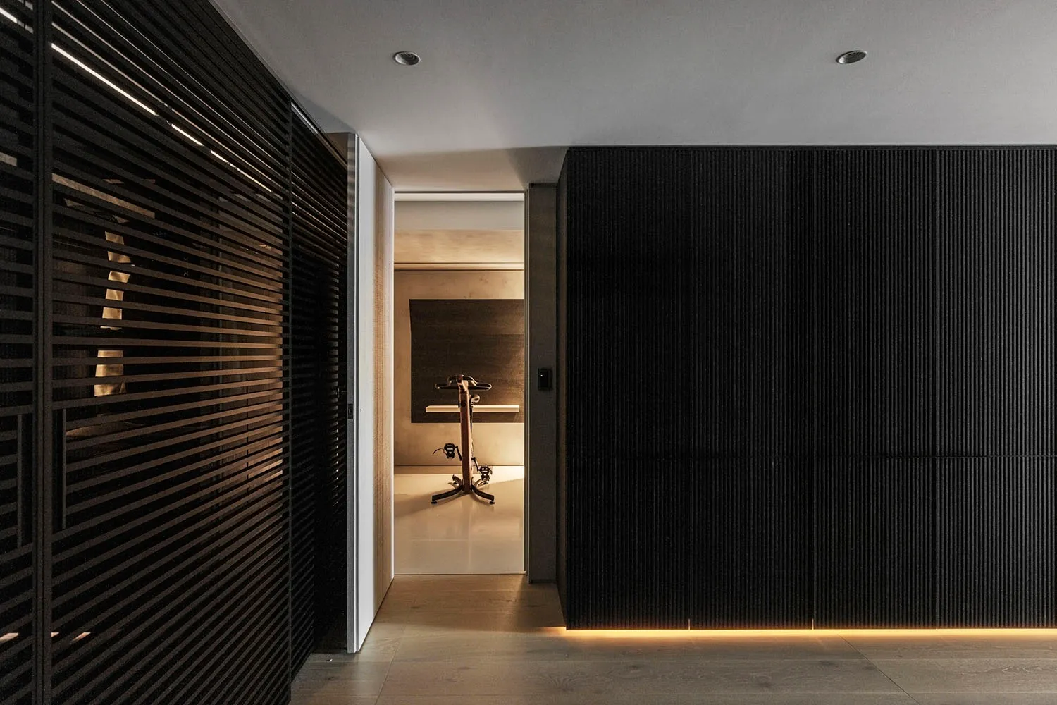 A modern minimalist living space featuring mixed materials, primarily wood.
