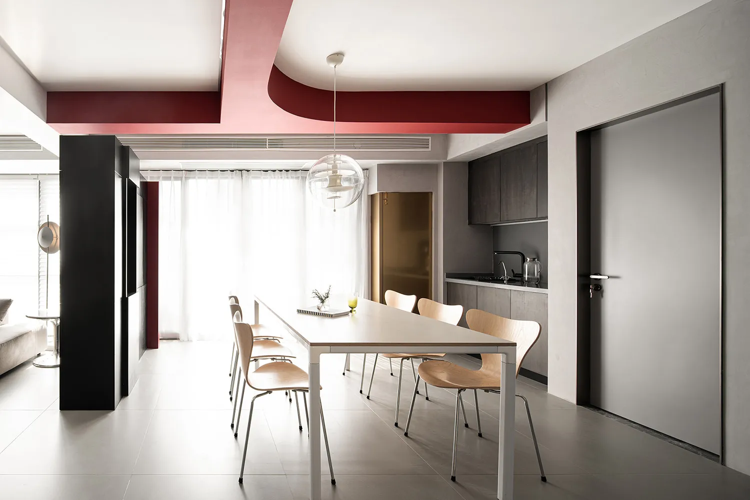 Modern residential interior featuring minimalist design with concrete and oak wood