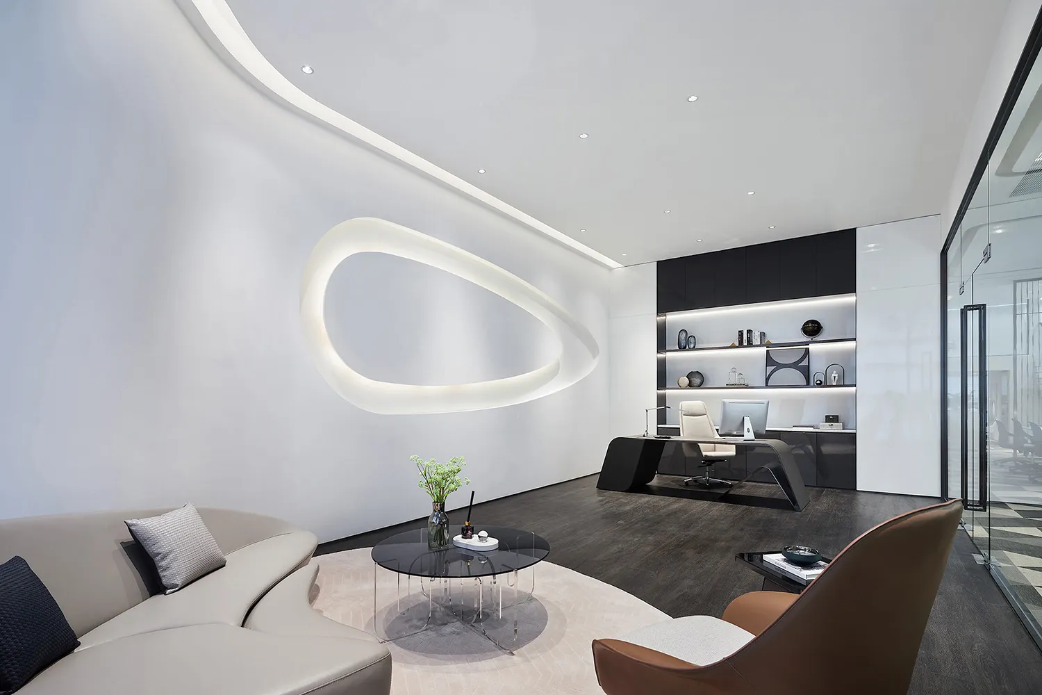Modern minimalist office space with glass elements and sleek furniture.