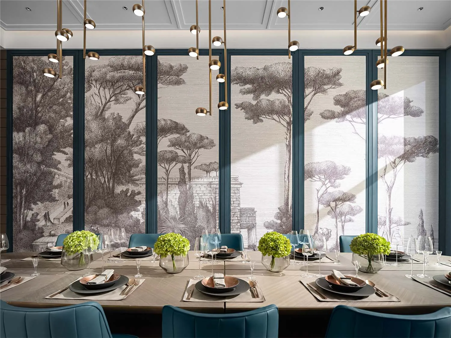 A modern dining room with a long wooden table, blue fabric chairs, and glass pendant lights.