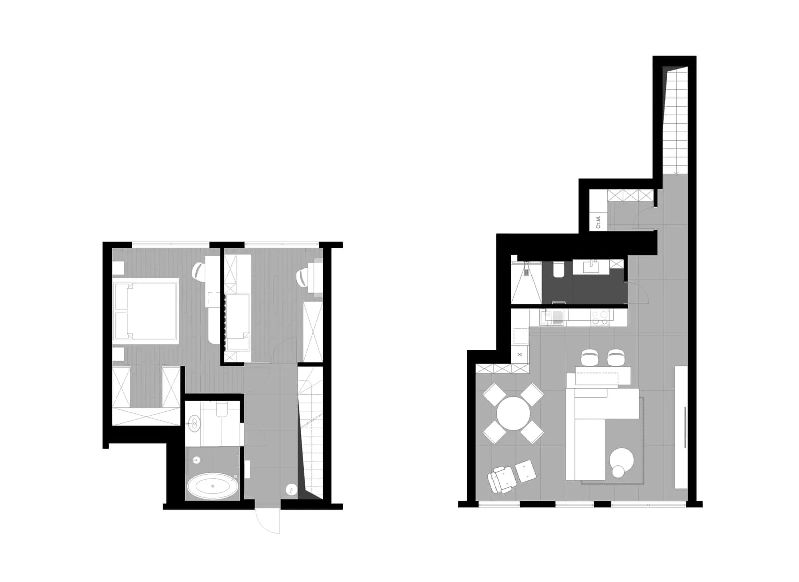 Floor plan of a modern residential interior with a central staircase and open living space.