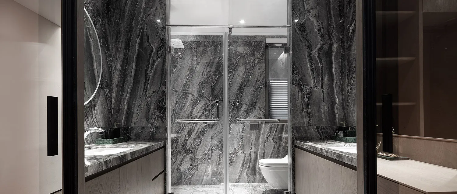 Modern bathroom with marble walls and floor