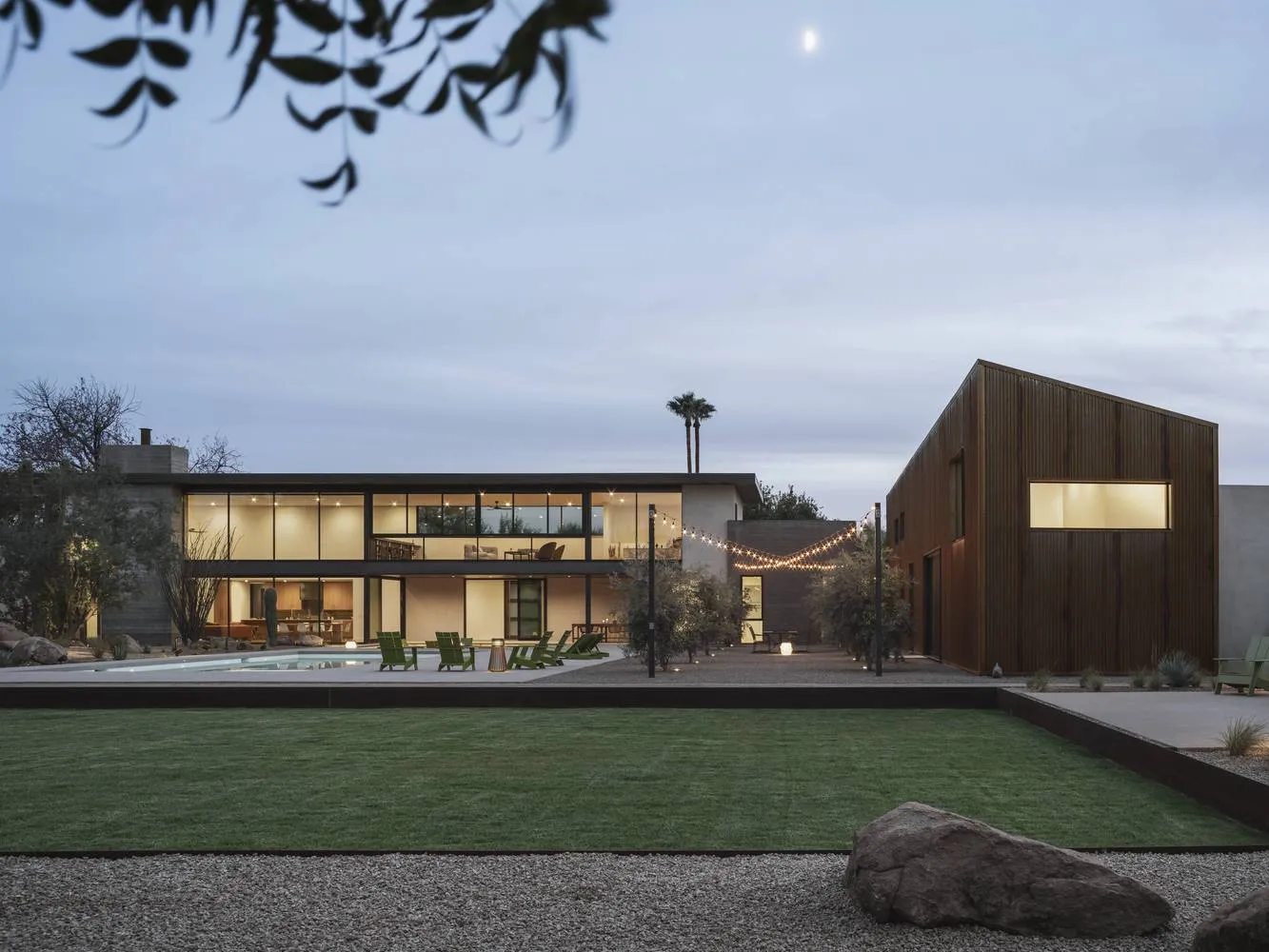A modern house exterior featuring a wooden exterior.