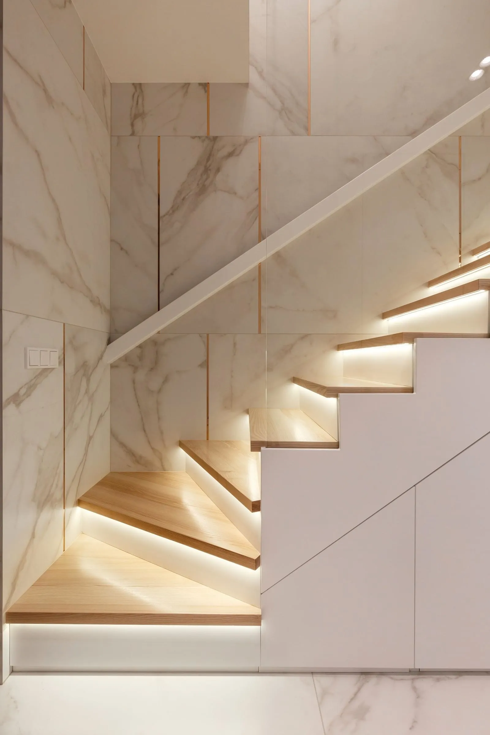 Modern staircase with marble and concrete materials