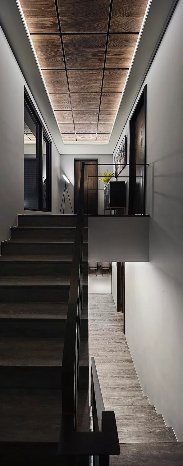 Modern minimalist staircase featuring a wooden design