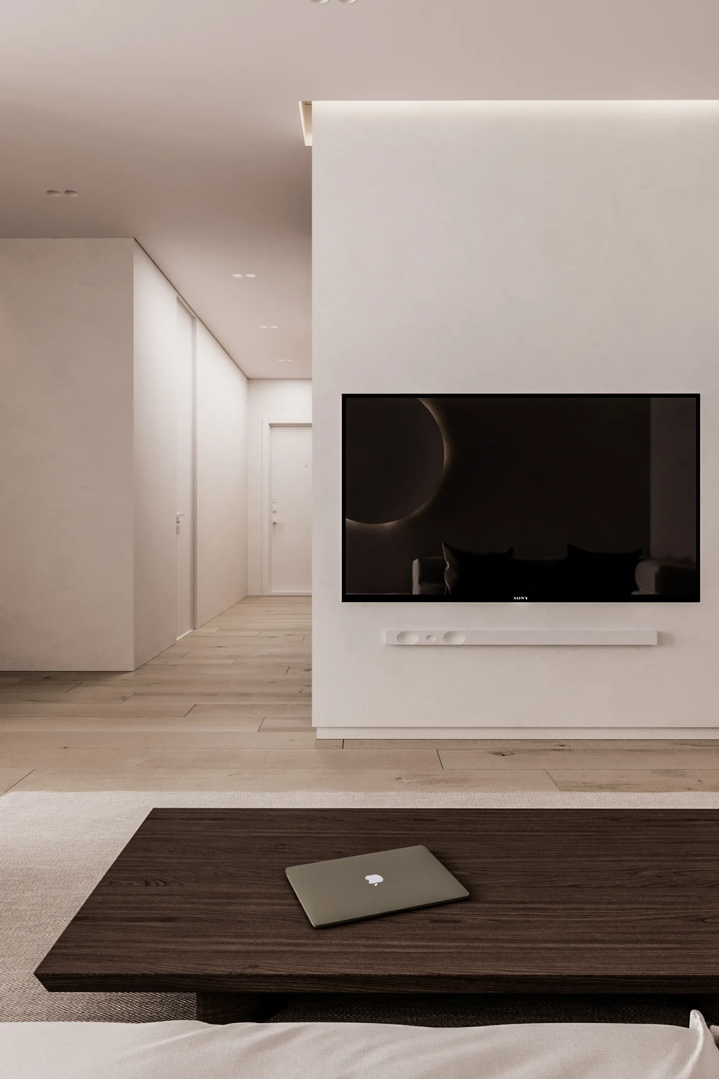 Minimalist living room featuring a wooden table, a television mounted on the wall, and a hallway in the background.