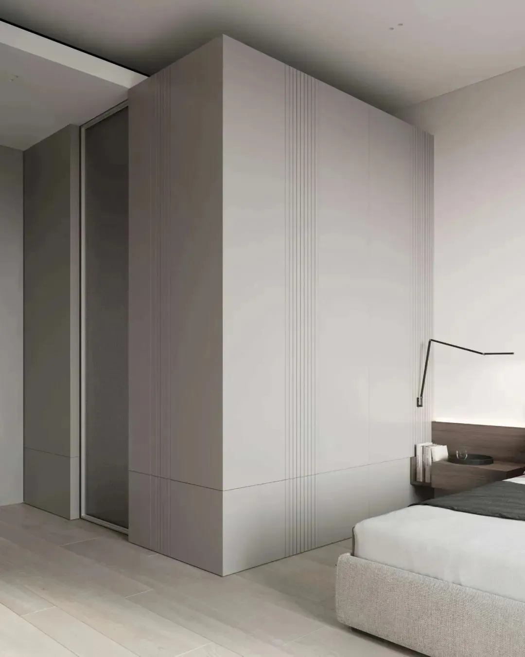 Modern minimalist bedroom featuring metallic accents and clean lines.