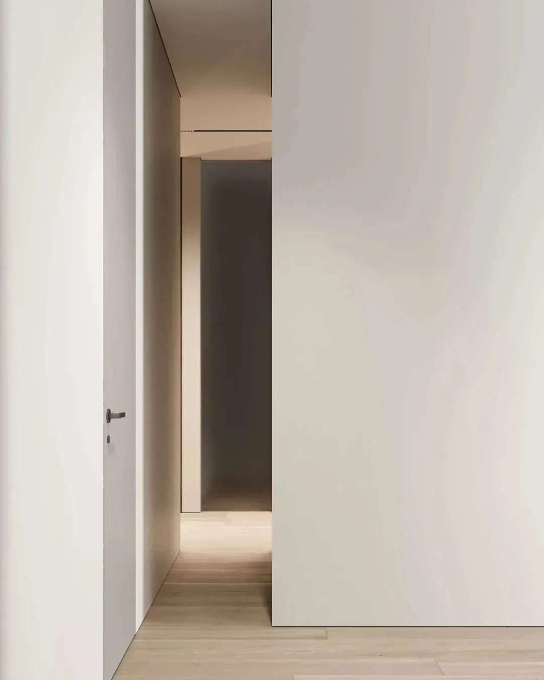 Interior design featuring a minimalist style with white walls and concrete floors.