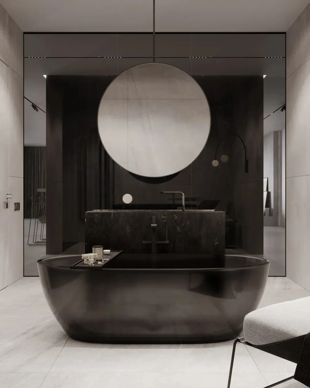 Modern bathroom with a black marble bathtub and sink.