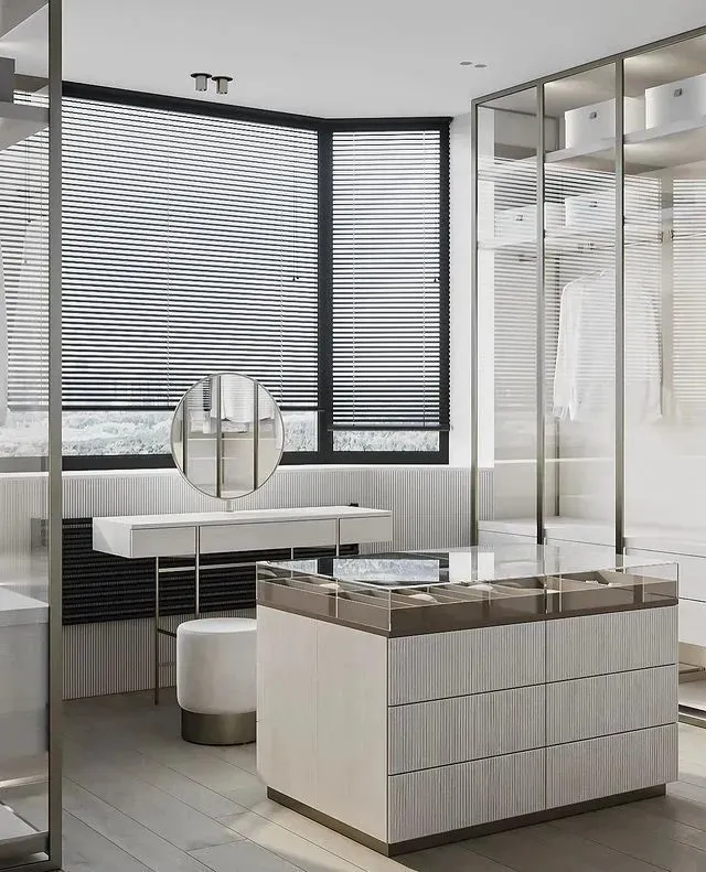 Modern bathroom with glass windows and minimalist design elements.