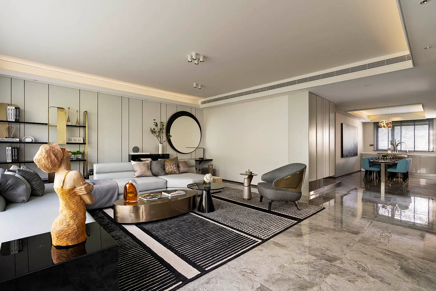 Modern minimalist living room featuring a marble floor and contemporary furniture.