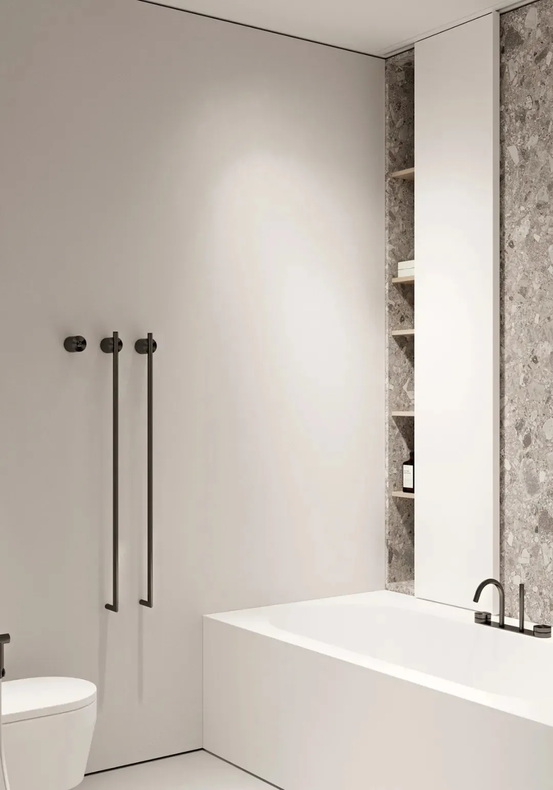 Modern minimalist bathroom with white terrazzo and white ceramic fixtures and fittings.