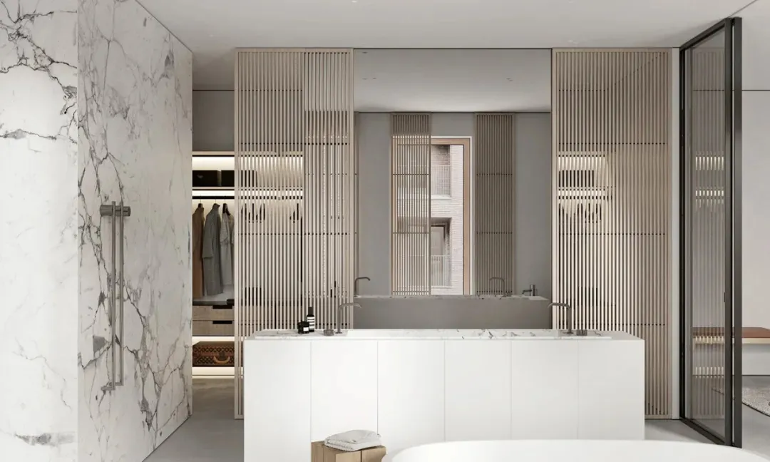 A modern minimalist bathroom with white marble walls and a wooden slatted privacy screen.