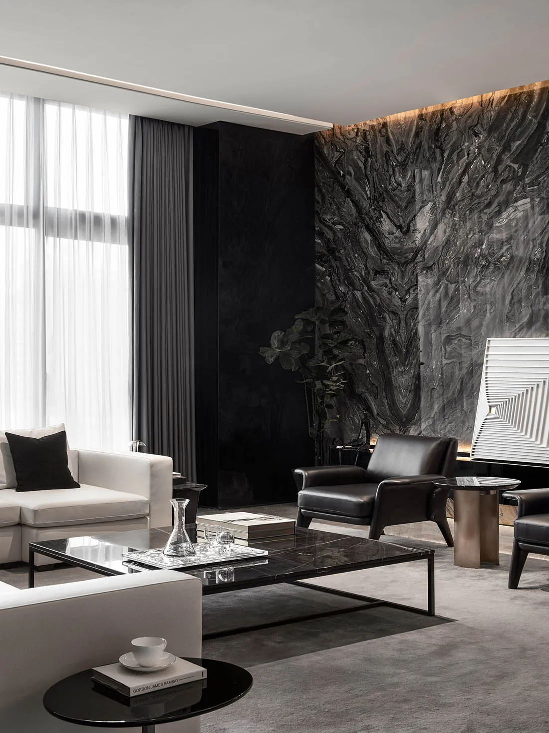 A modern living room featuring marble elements and minimalist design