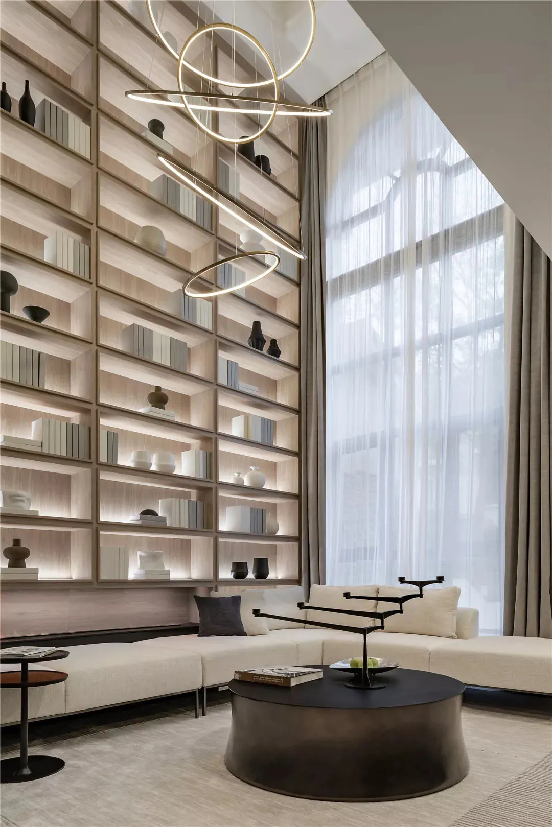 A contemporary living room with a modern interior design, featuring wooden materials, a sectional sofa, and a stylish coffee
