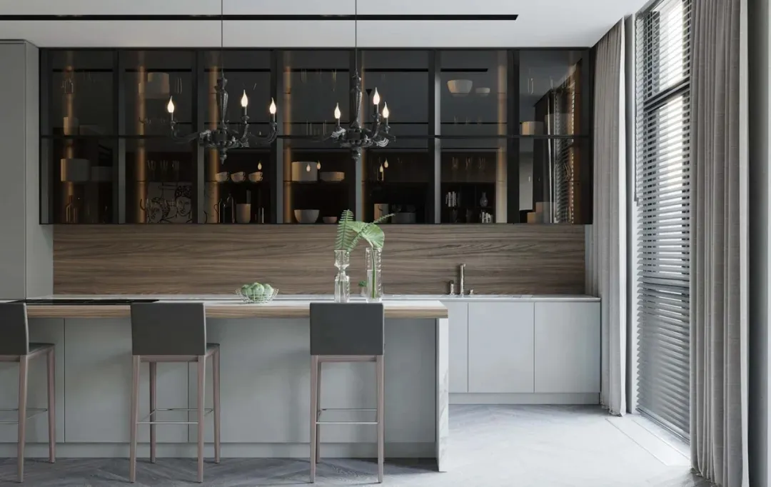 Modern kitchen featuring glass-front cabinets and metallic accents