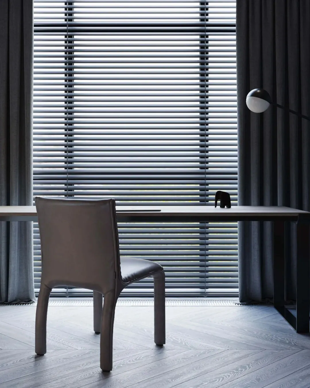 Modern home office featuring a wooden desk and chair with a minimalist design aesthetic.