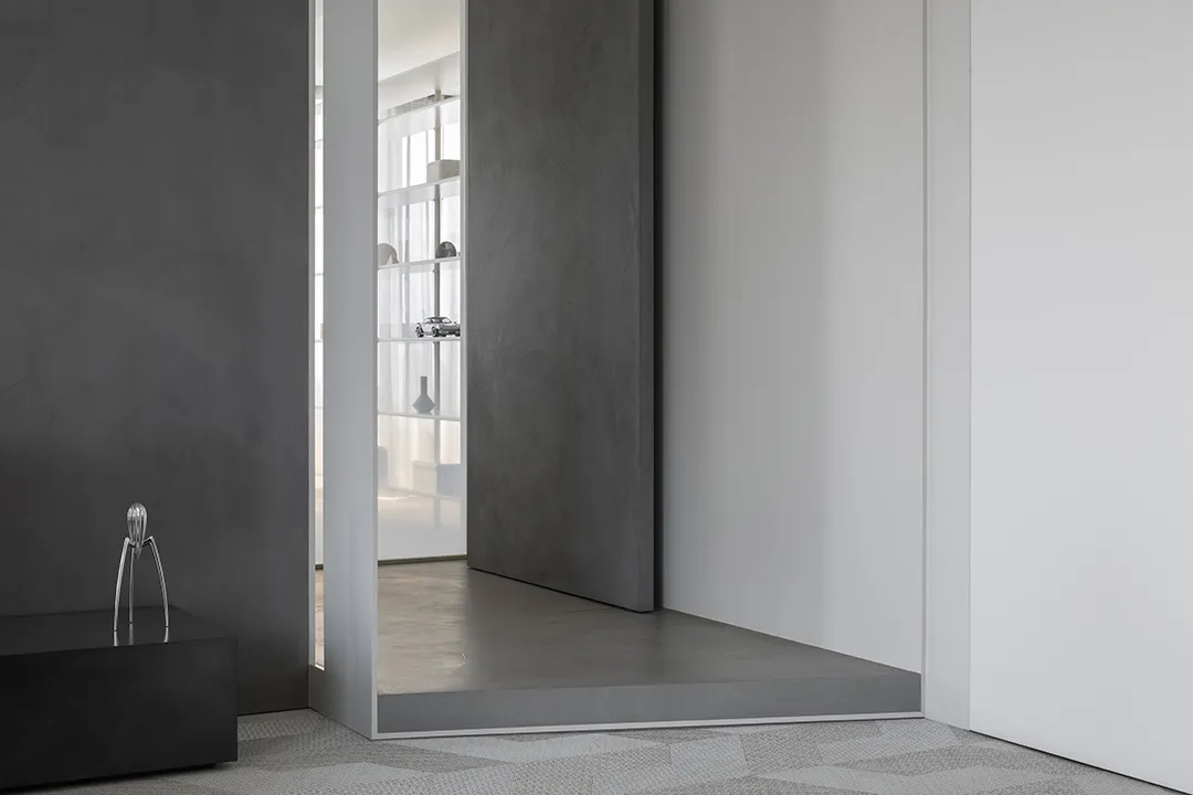 Modern interior space featuring minimalist design and concrete elements.