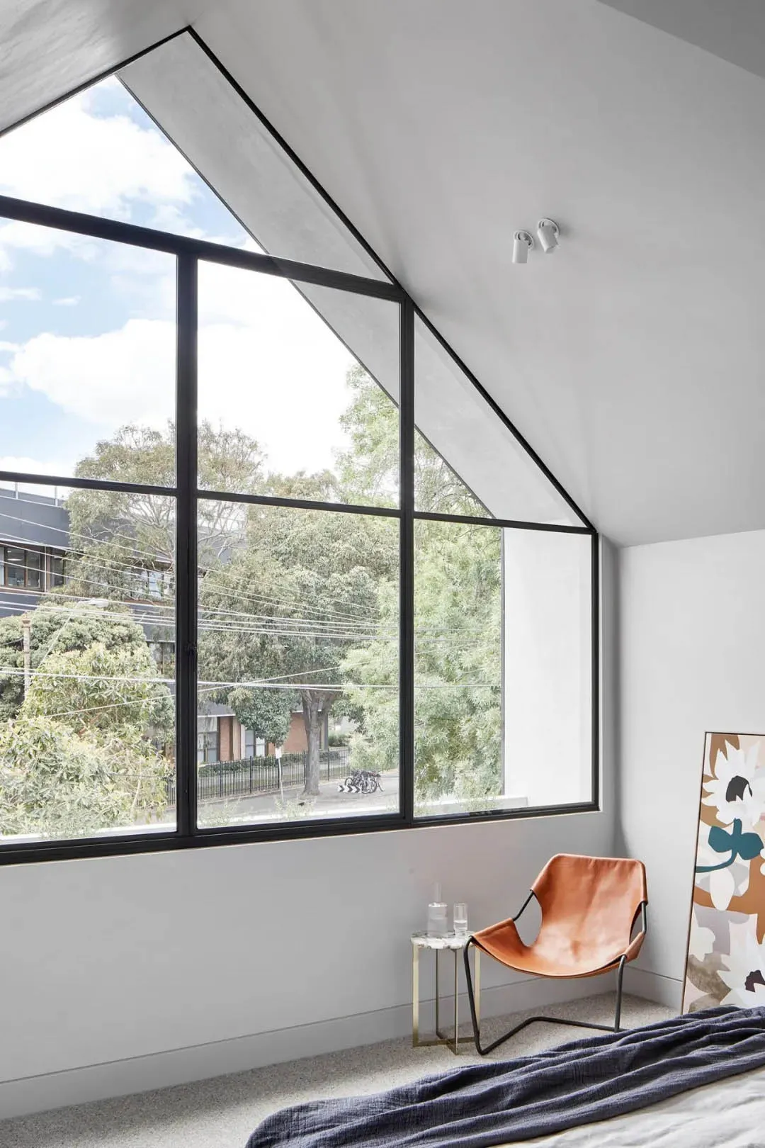 Modern interior design featuring a large glass window