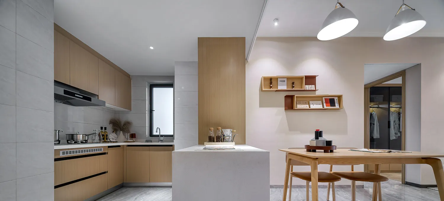 Modern minimalist kitchen with wooden cabinets, a central island, and a white countertop.