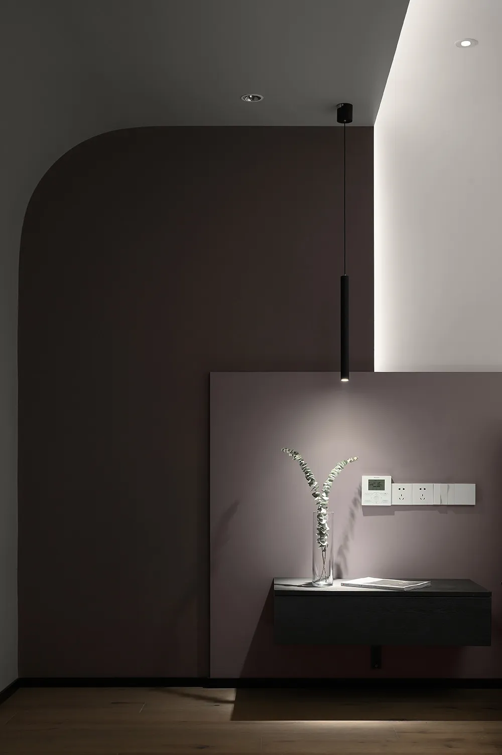 Minimalist bedroom featuring modern materials and sleek design.