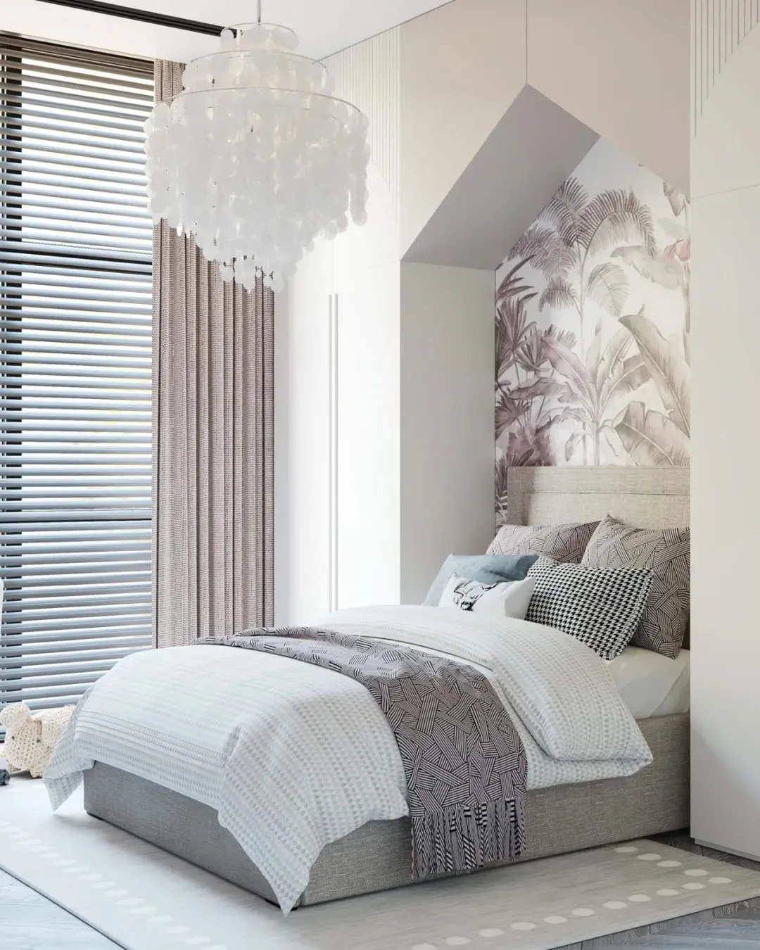 Modern bedroom interior featuring a white fabric bed, glass chandelier, and palm leaf wallpaper.