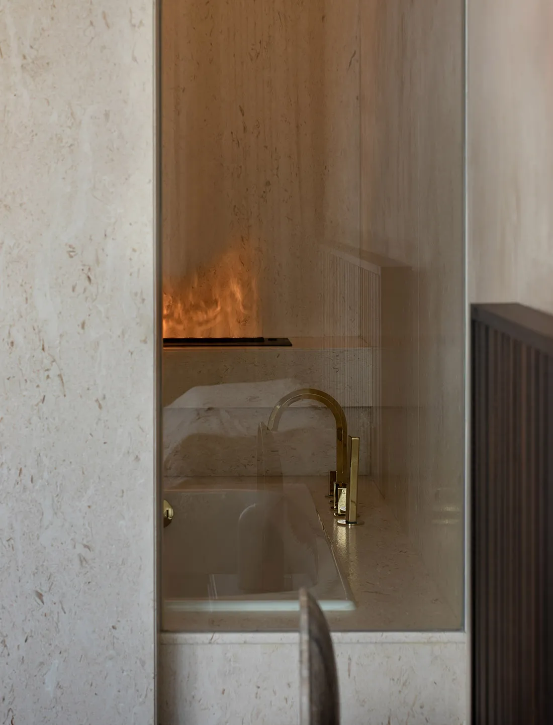 Minimalist bathroom designed with marble materials