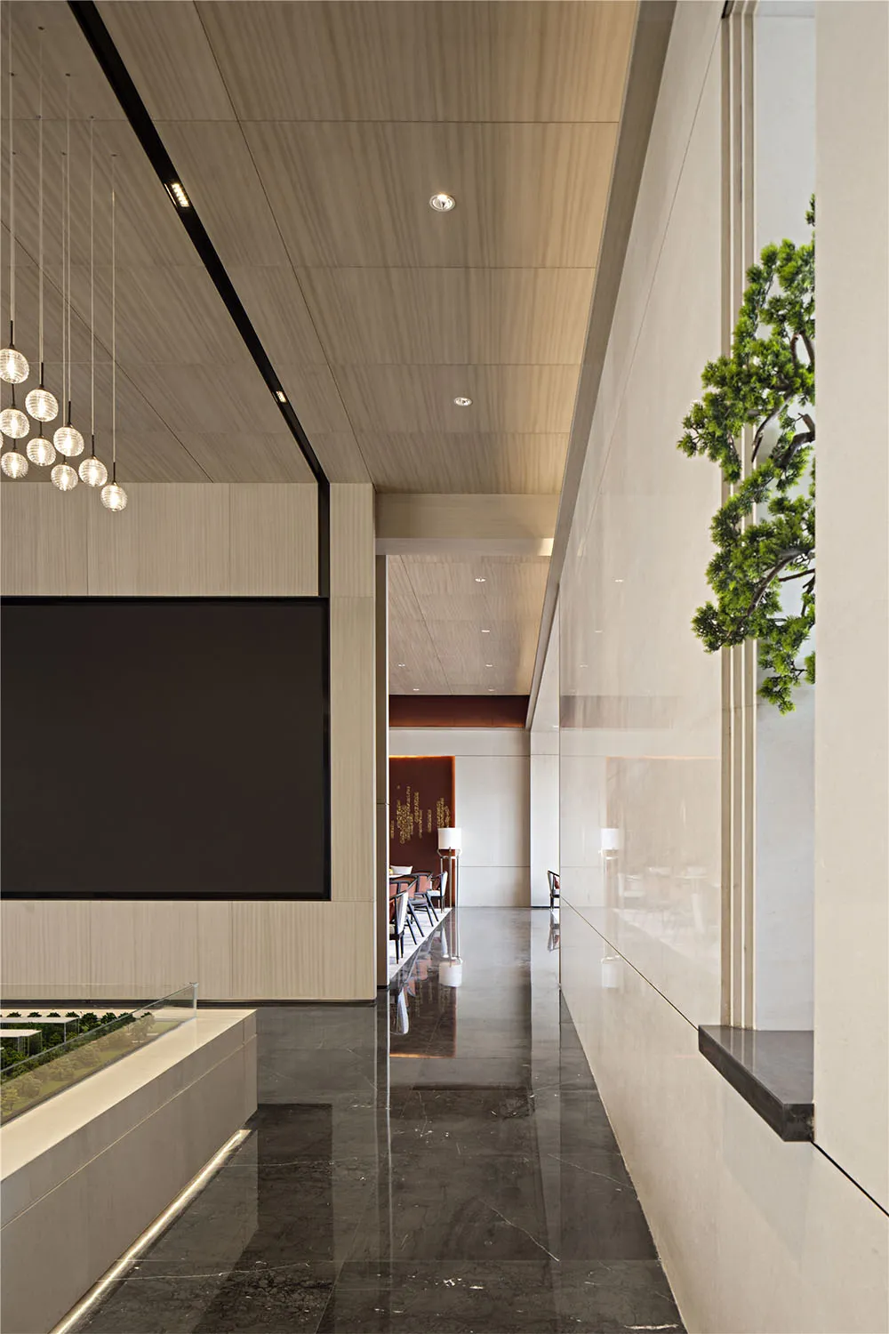 An image of a modern office with marble flooring and a minimalist design.