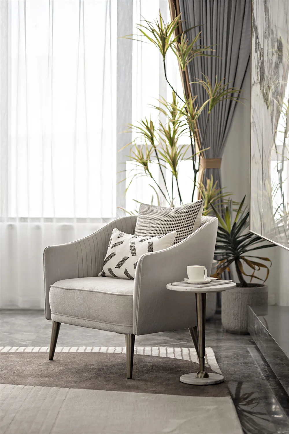 A modern fabric armchair in a contemporary living room setting, featuring minimalist design and plush seating.