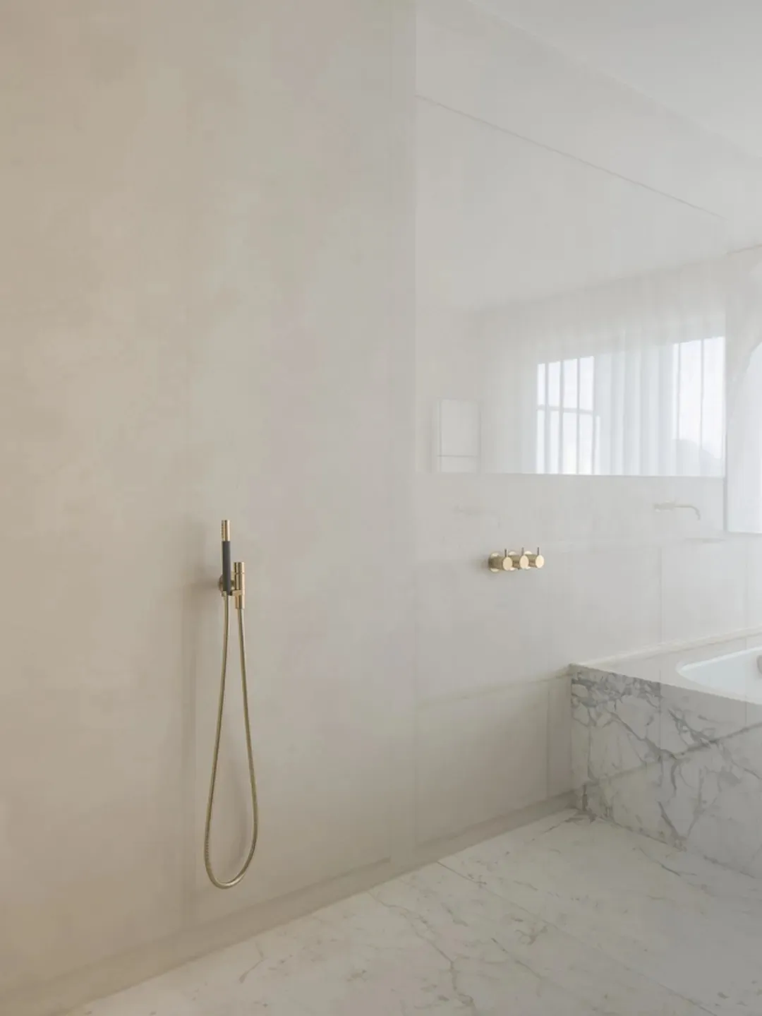 Modern minimalist bathroom design with marble floor and walls, featuring a sleek walk-in shower with brass fixtures.