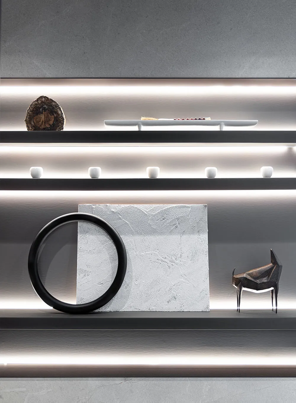 A modern minimalist interior design featuring concrete elements and a sleek, contemporary atmosphere.