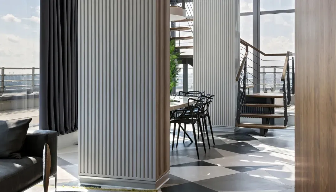 A modern interior design featuring a combination of wood, glass, and metal materials.
