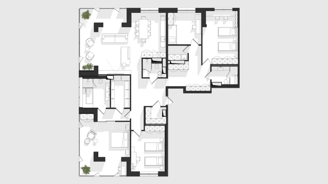 Floor plan of a modern apartment showing living areas, bedrooms, bathrooms, and kitchen.