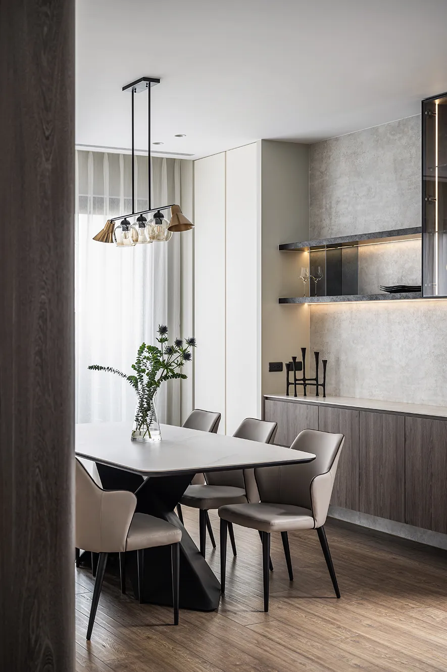 Modern kitchen featuring marble countertops and minimalist design.