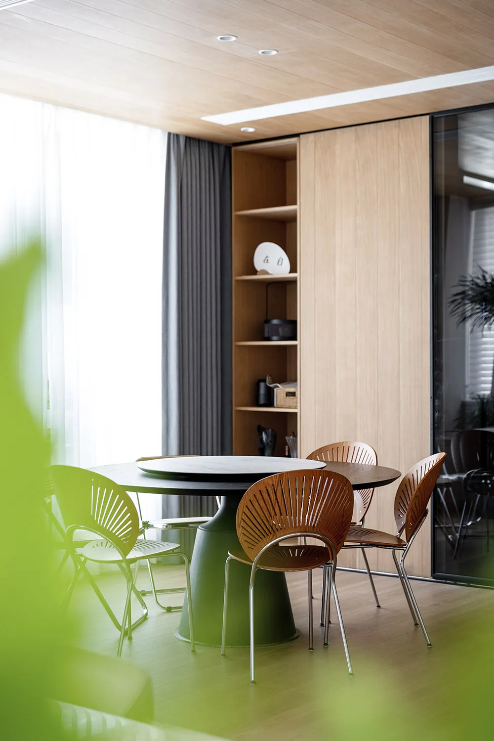 A modern, well-lit home office space featuring modern furniture and a sleek, minimalist design.